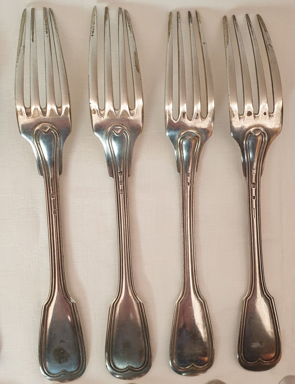 15 spoons & 4 silver metal forks