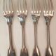15 spoons & 4 silver metal forks