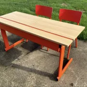 Vintage orange double school desk with its 2 matching chairs.