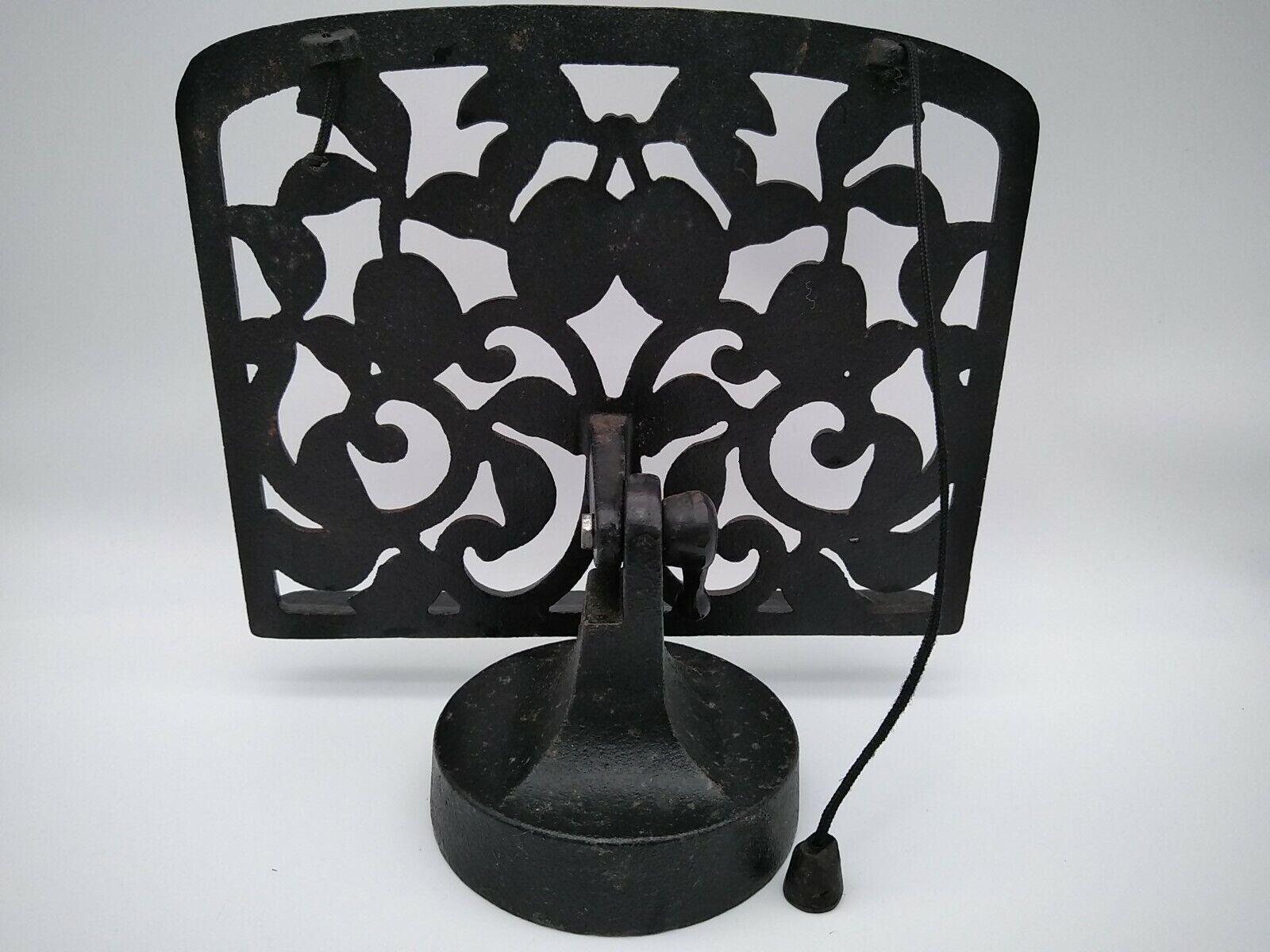 Cast iron lectern or lectrin with fruit decoration.