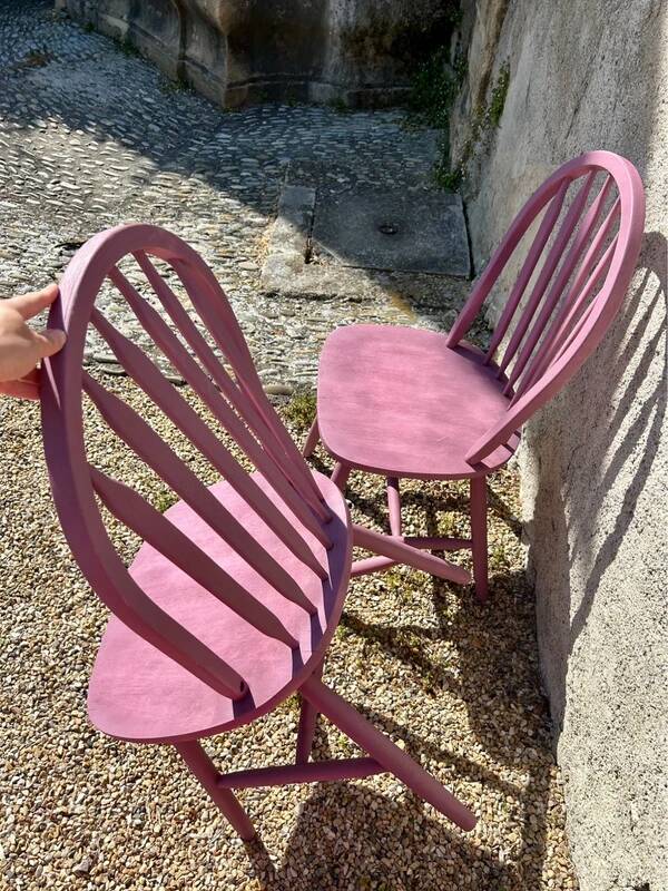 Pink slatted chairs