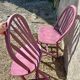 Pink slatted chairs