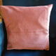 Rust-colored velvet cushion cover