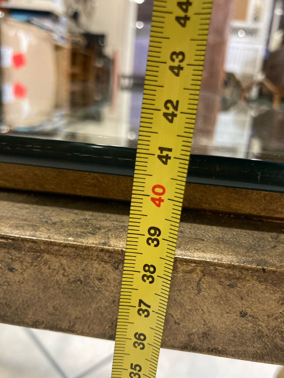 Table basse en fer et plateau en verre