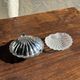 Vintage silver-plated shell butter dish with transparent bowl.