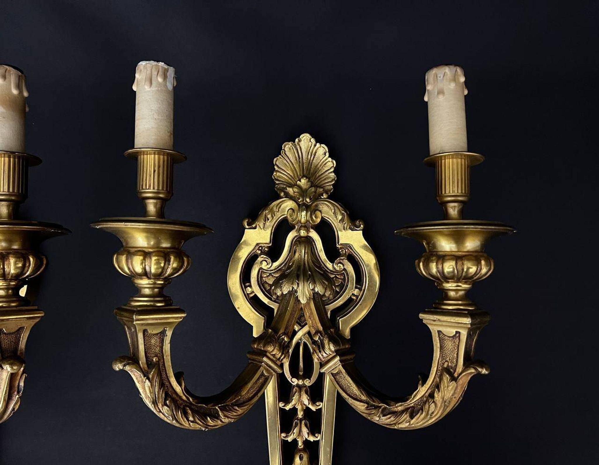 Large pair of gilt bronze wall sconces in the Louis XVI style.