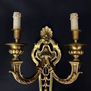 Large pair of gilt bronze wall sconces in the Louis XVI style.