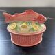 Fish terrine with lemon in a sauce.