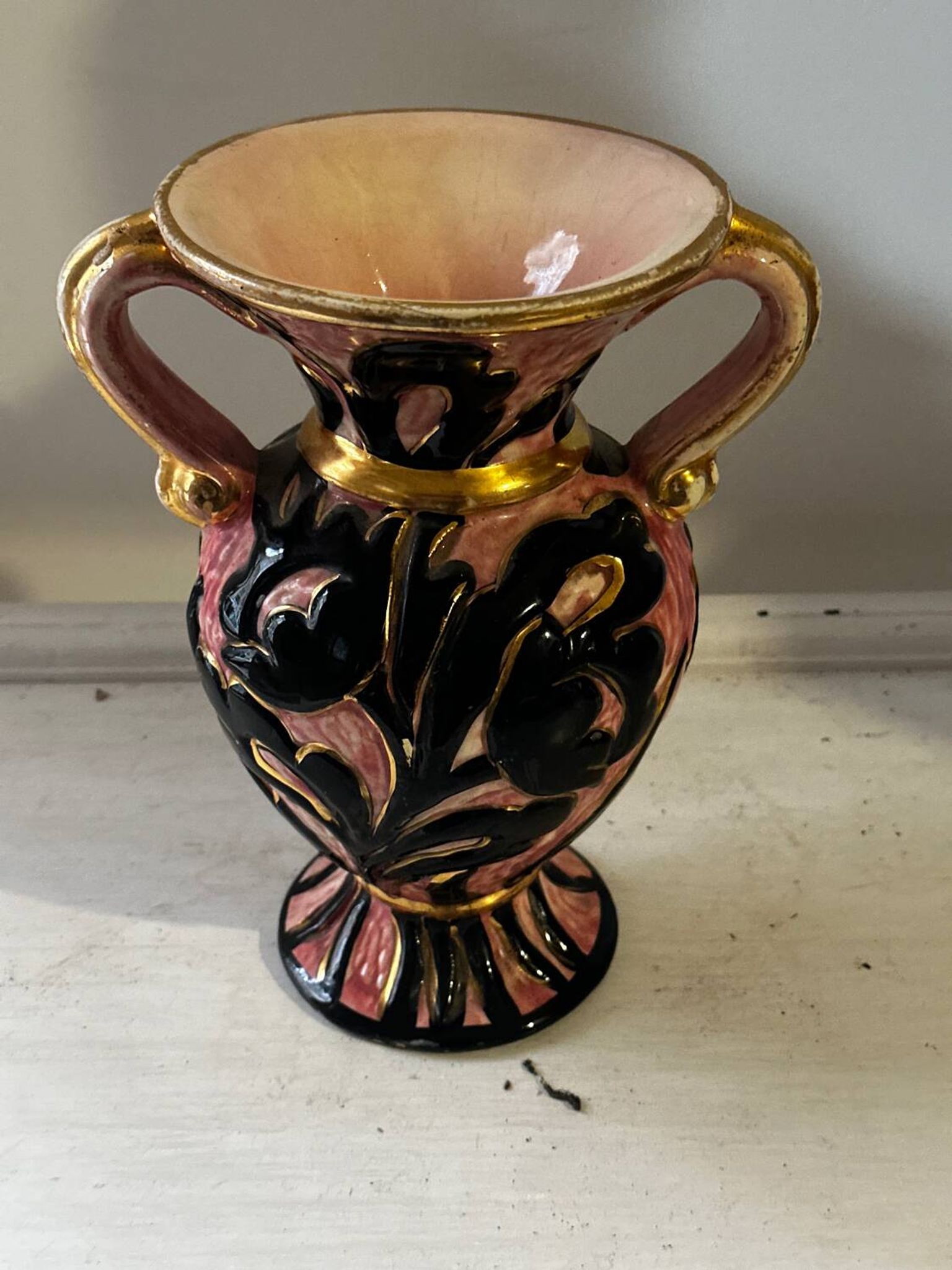Vintage Vallauris vase amphora with relief floral decoration.