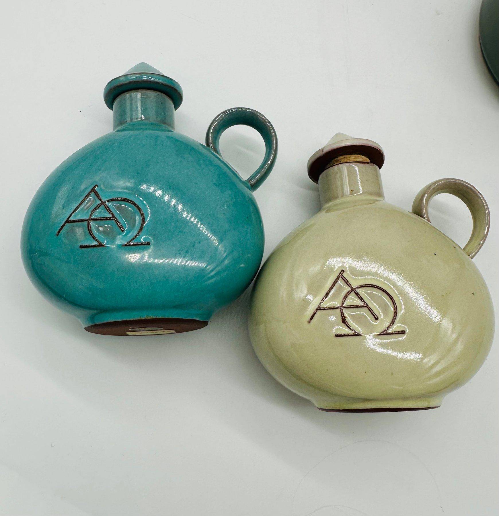 Set of nine modern sculptural ceramic vases from the mid-century, Bauhaus influence.