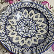 Moroccan dish in handcrafted sculpted ceramic, blue geometric patterns and