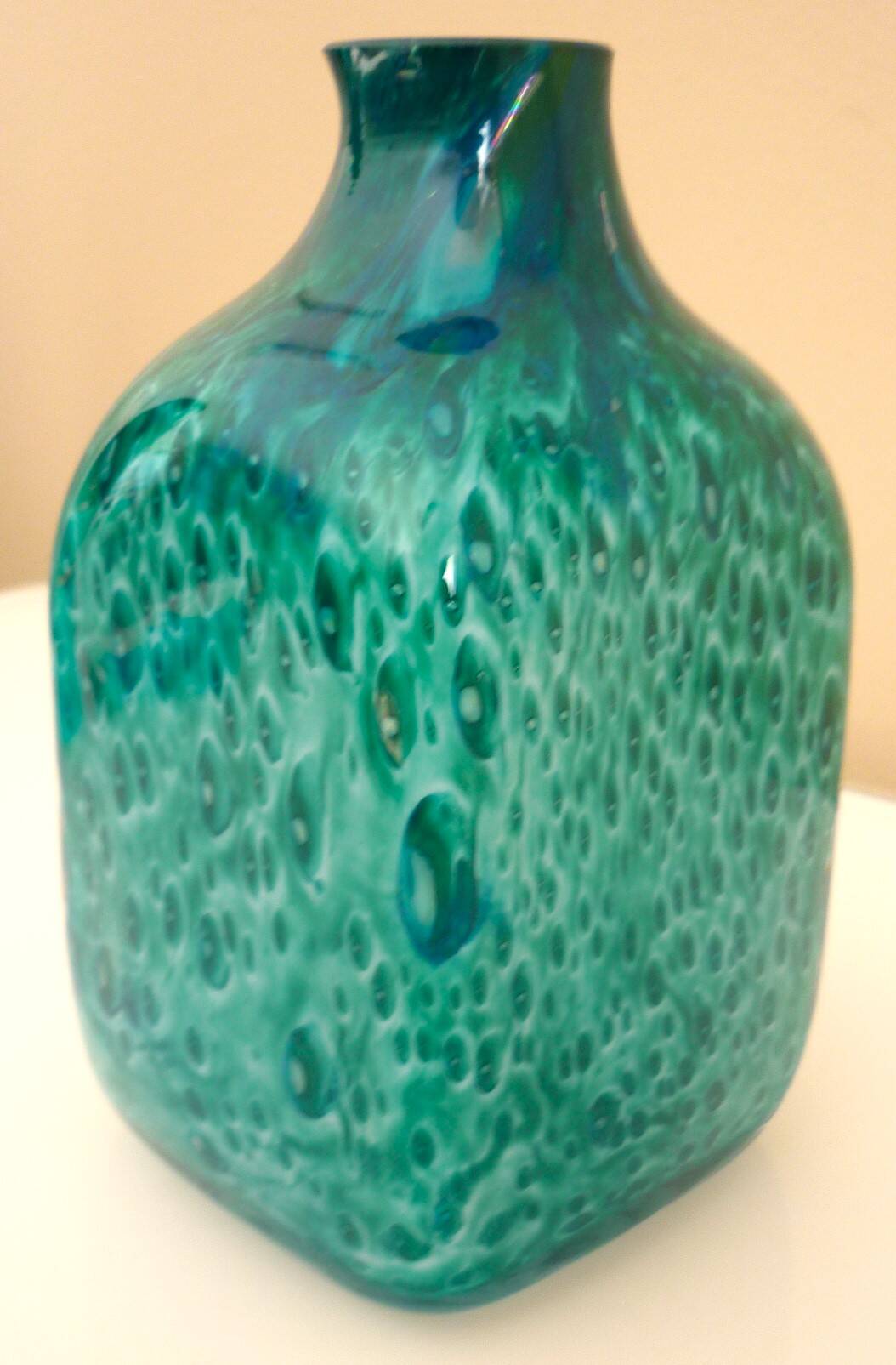 White multi-layer blown glass bottle vase with blue and green inclusions
