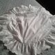 Housse de coussin ronde monogramme brodé