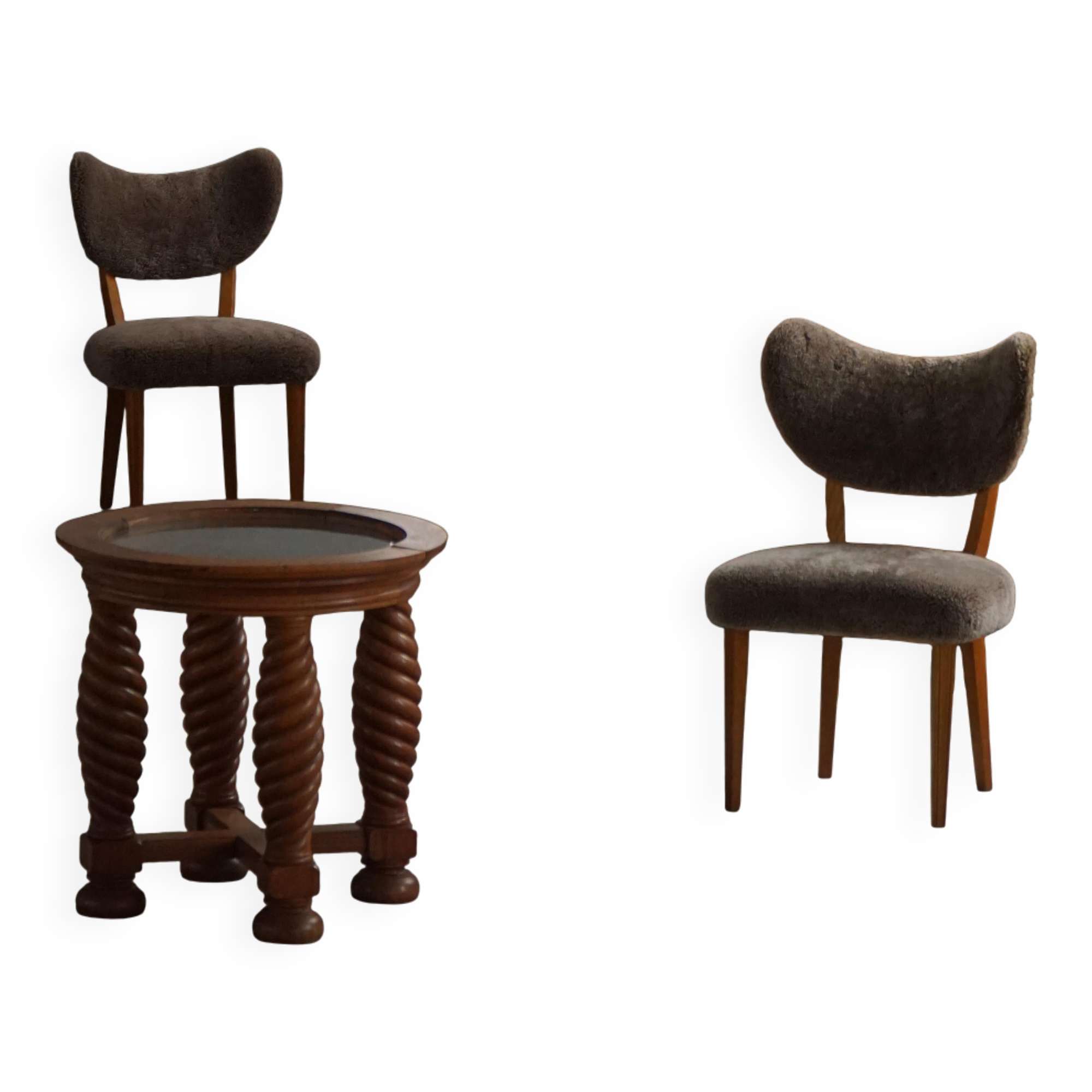 Modern Danish mid-century table, made of oak with spiral turned legs and a glass top, 1950s.