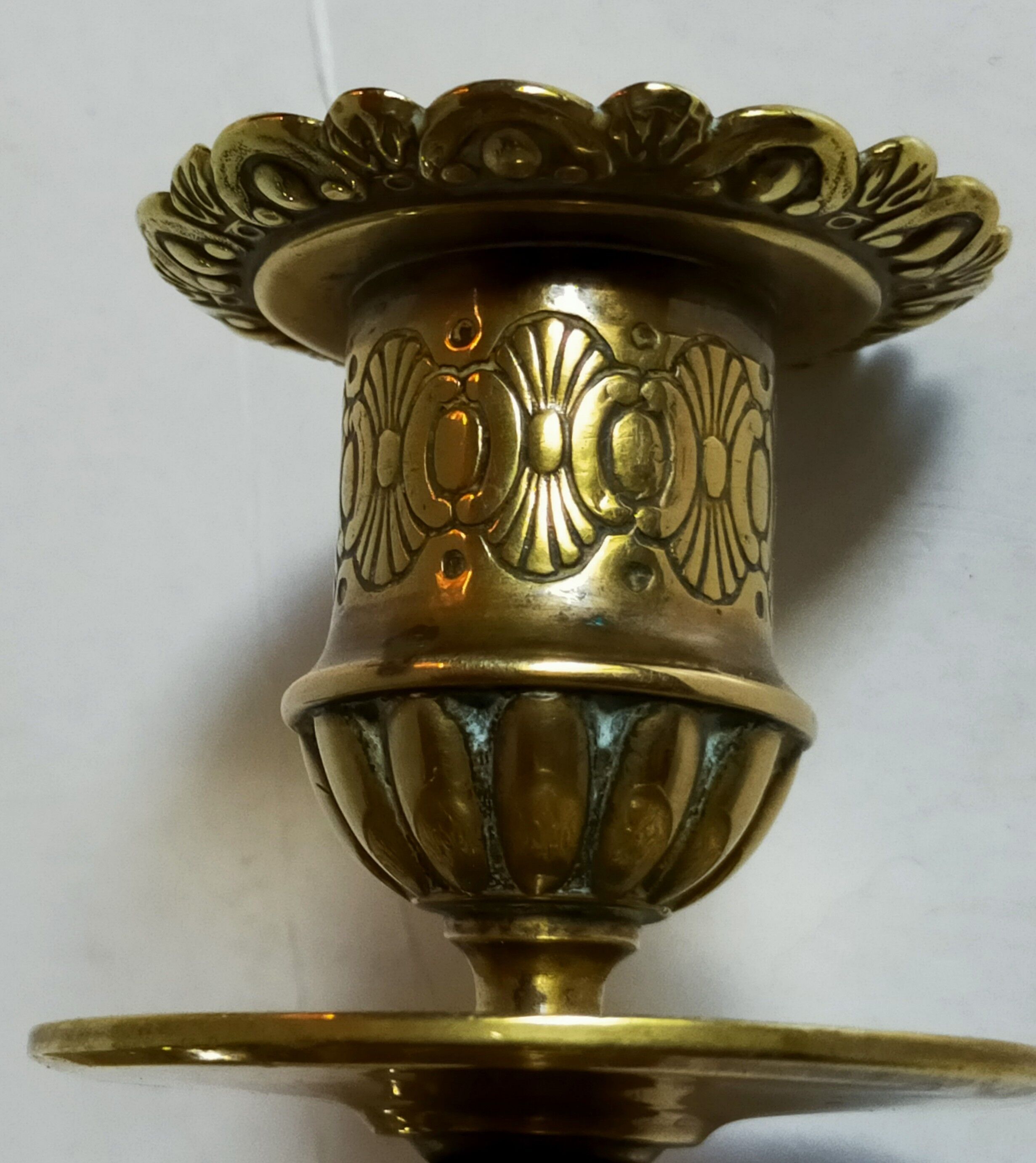 Duo of solid brass and gold metal candle holders worked old