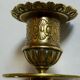 Duo of solid brass and gold metal candle holders worked old