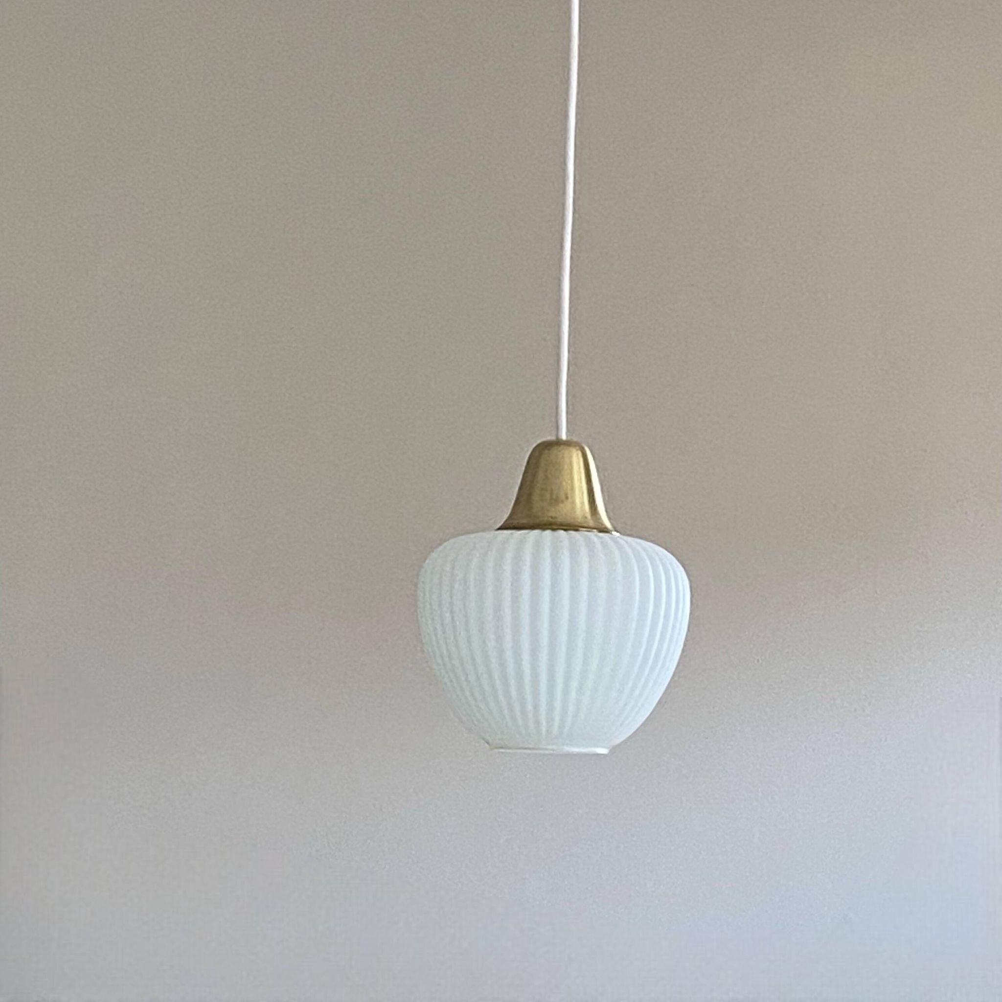 Antique pendant light in white glass and brass, vintage decoration