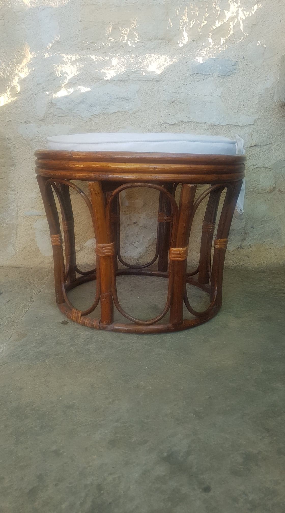 Rattan pouf with cushion