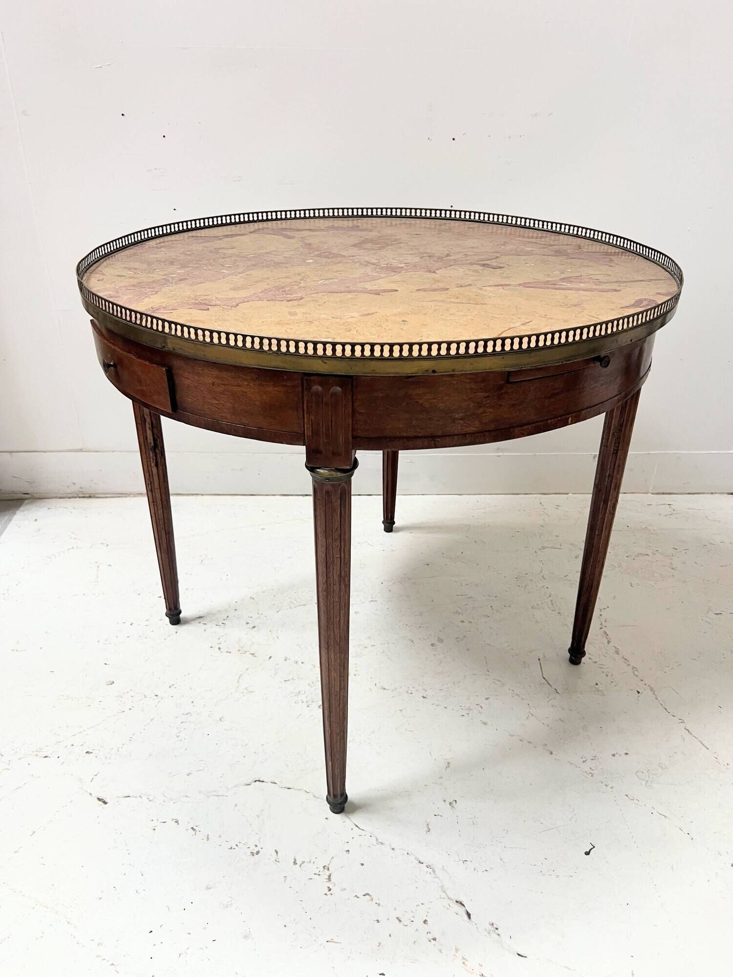 Louis XVI style bouillotte table in veneered wood, 20th century.