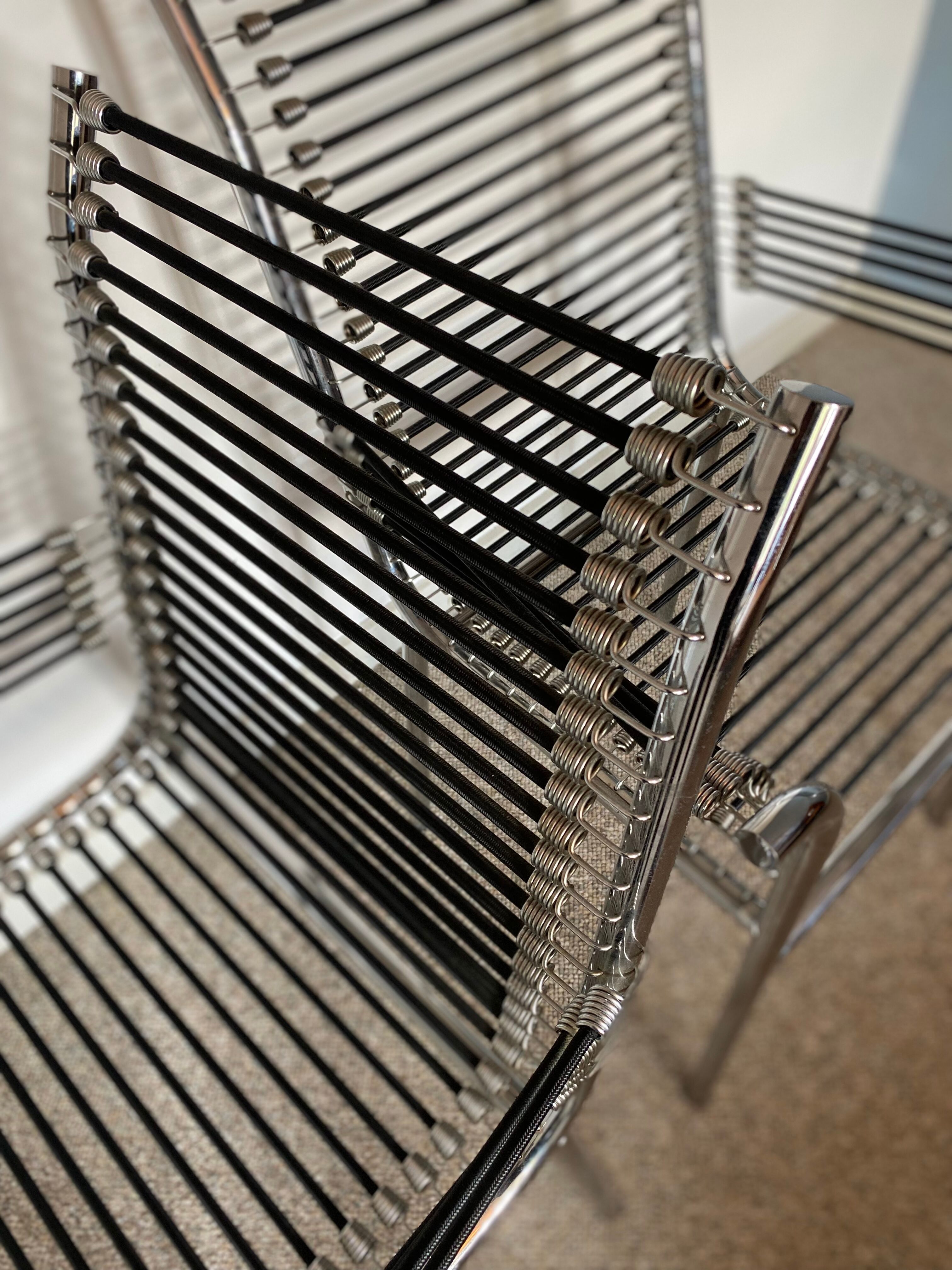 Set of 4 ‘bungee’ lounge chairs