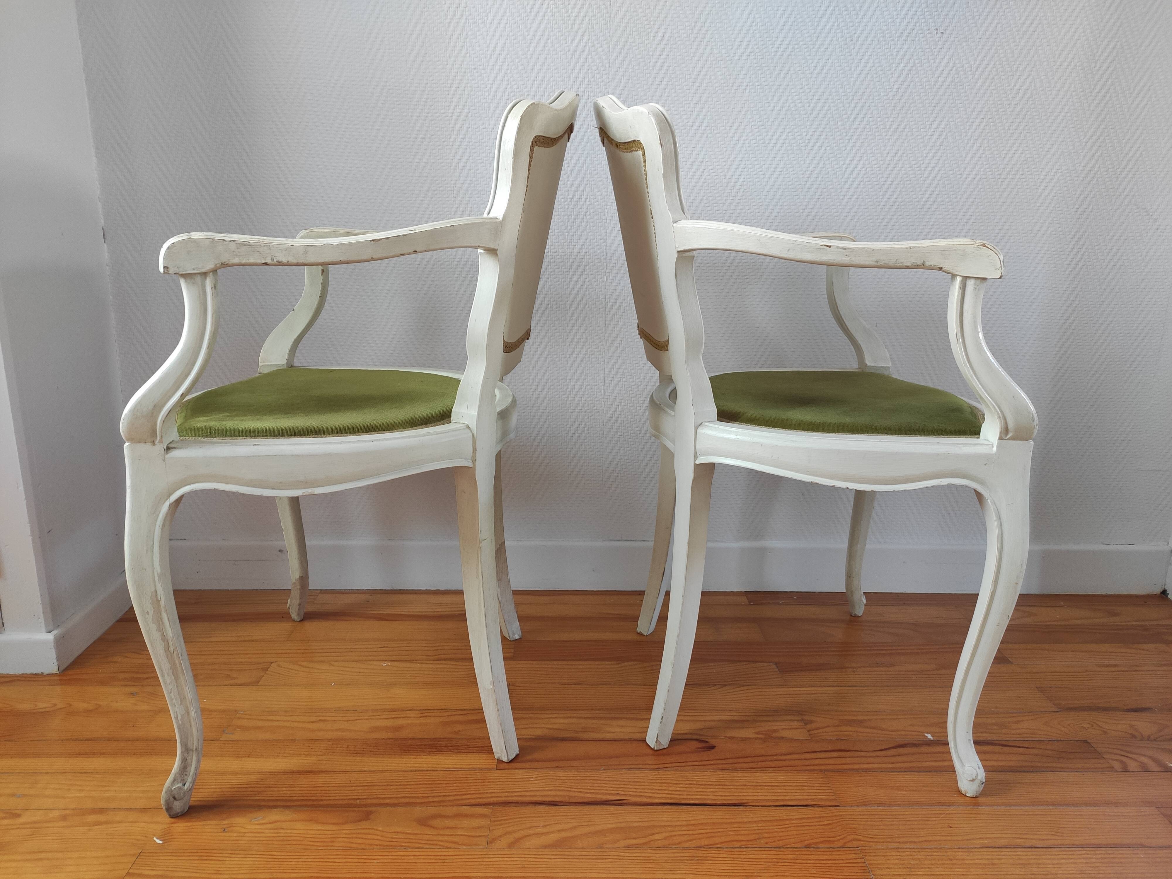 Pair of patinated armchairs