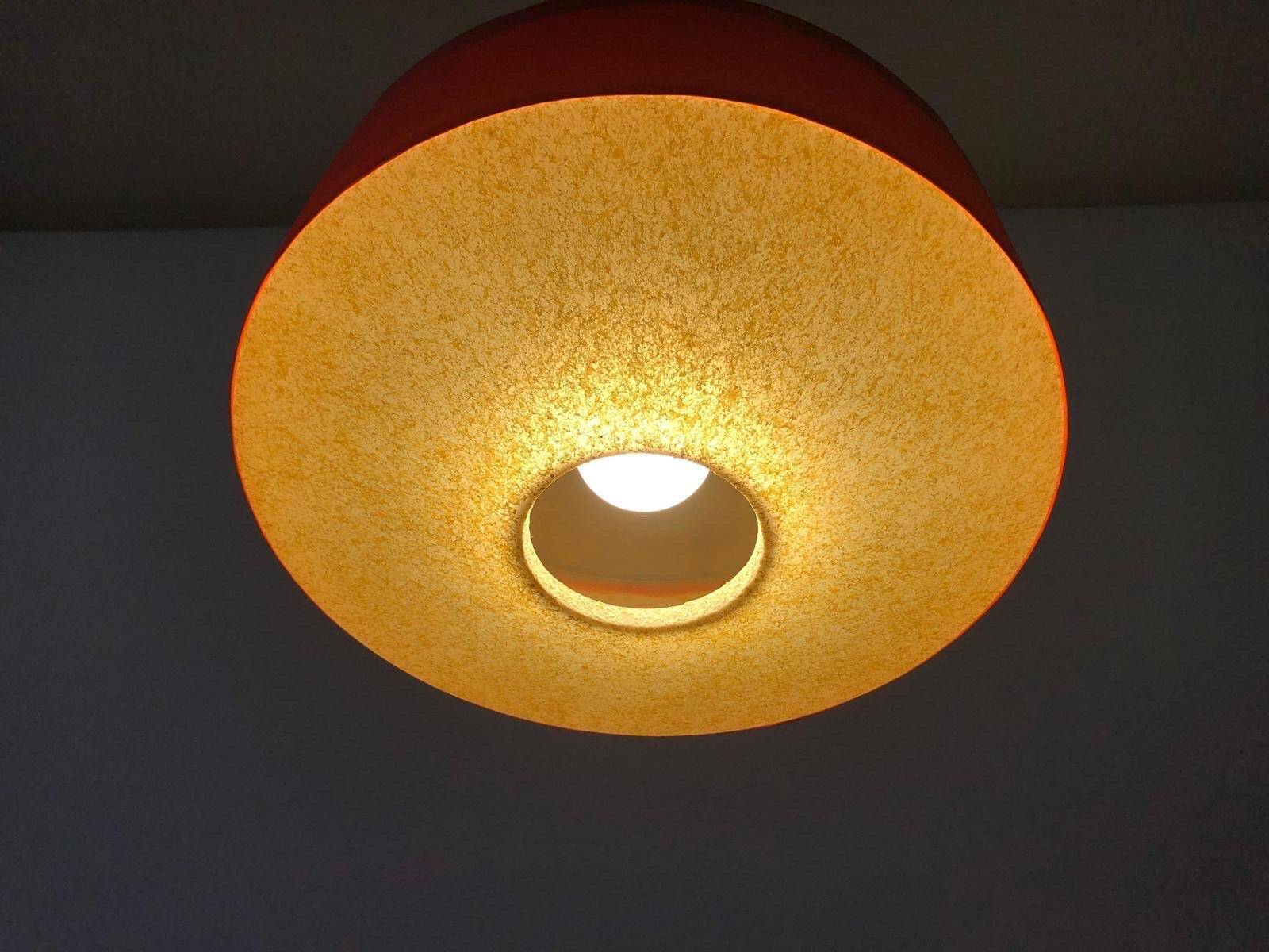 Red fabric ceiling light with textured plexiglass shade by Temde, 1960s, Germany.
