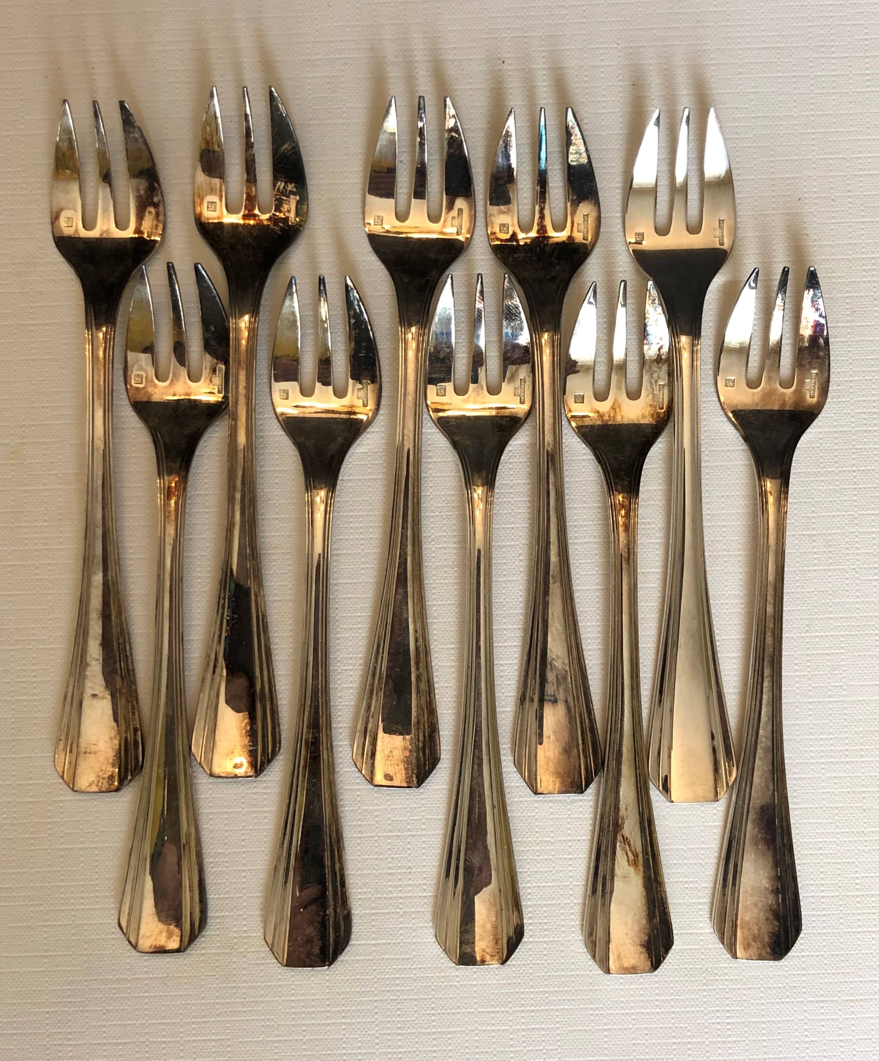 Set of 10 Christofle oyster forks in silver metal