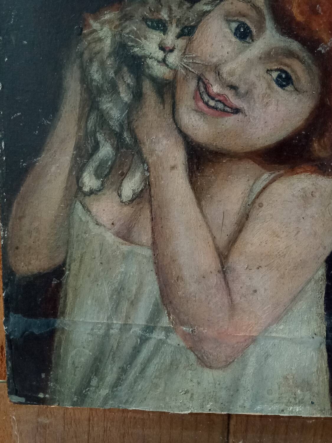 Portrait enfant et chat sur panneau de bois