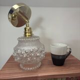 Gold wall light with bubble glass