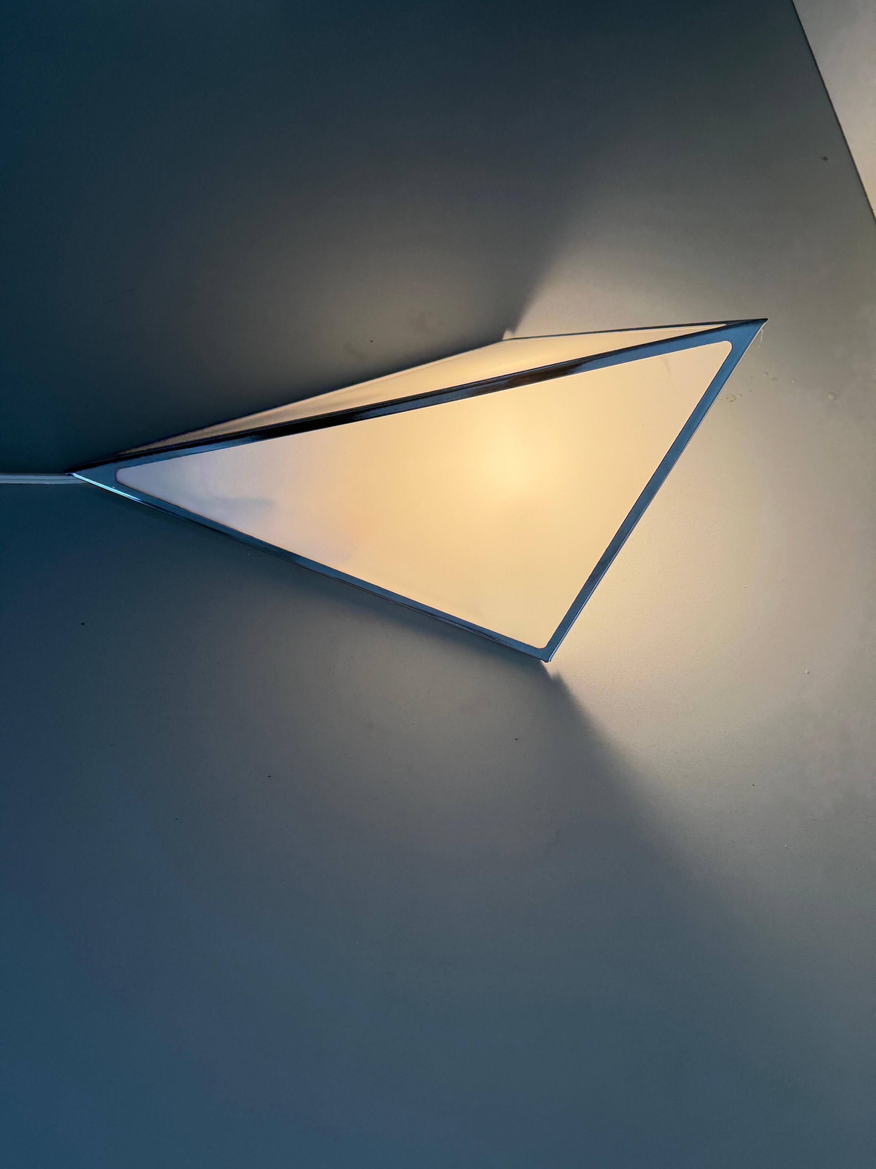 Simple opal glass wall light with an aluminium body, 1980s, Germany.