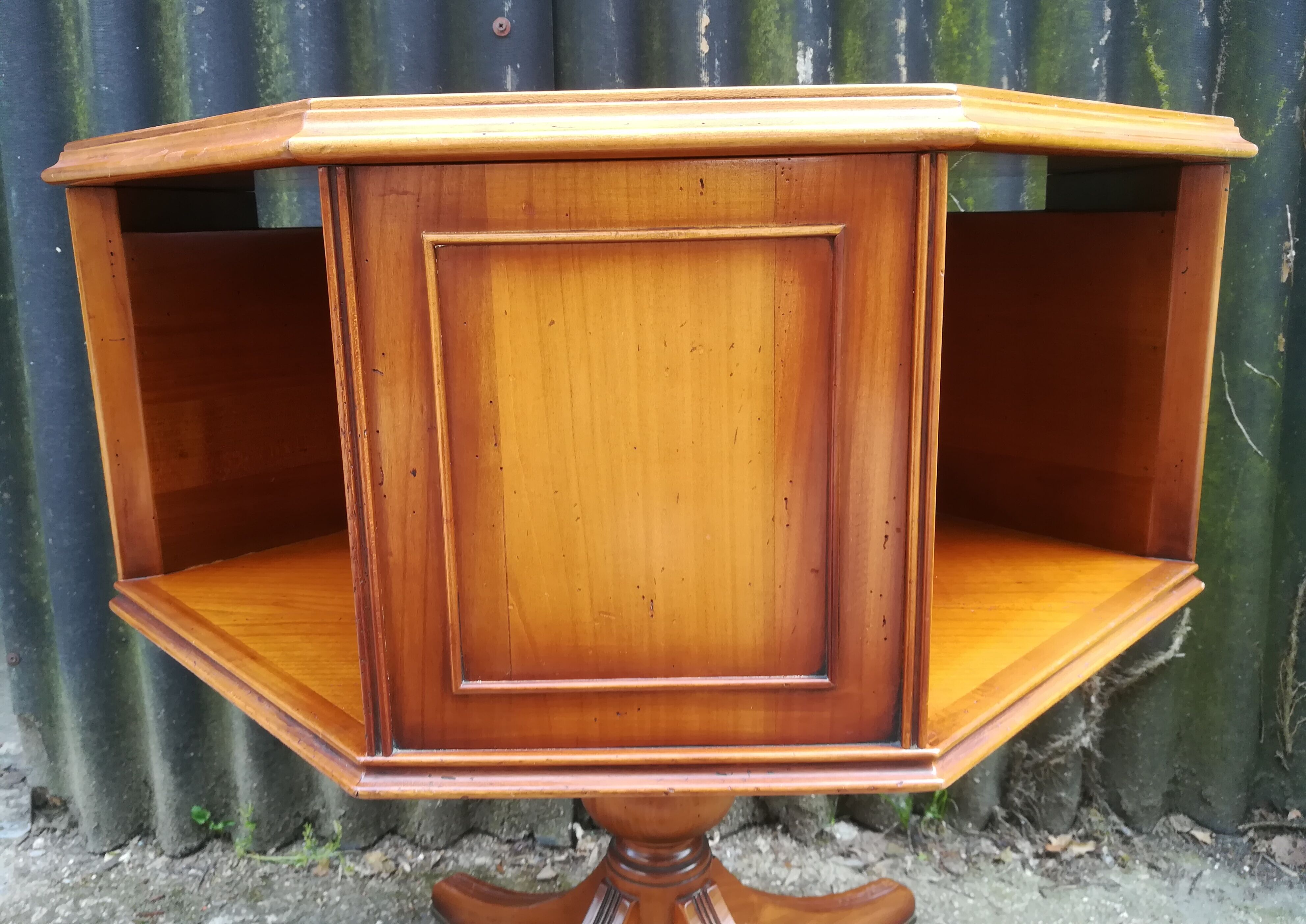 Storage cabinet revolving in cherry