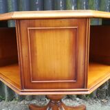 Storage cabinet revolving in cherry