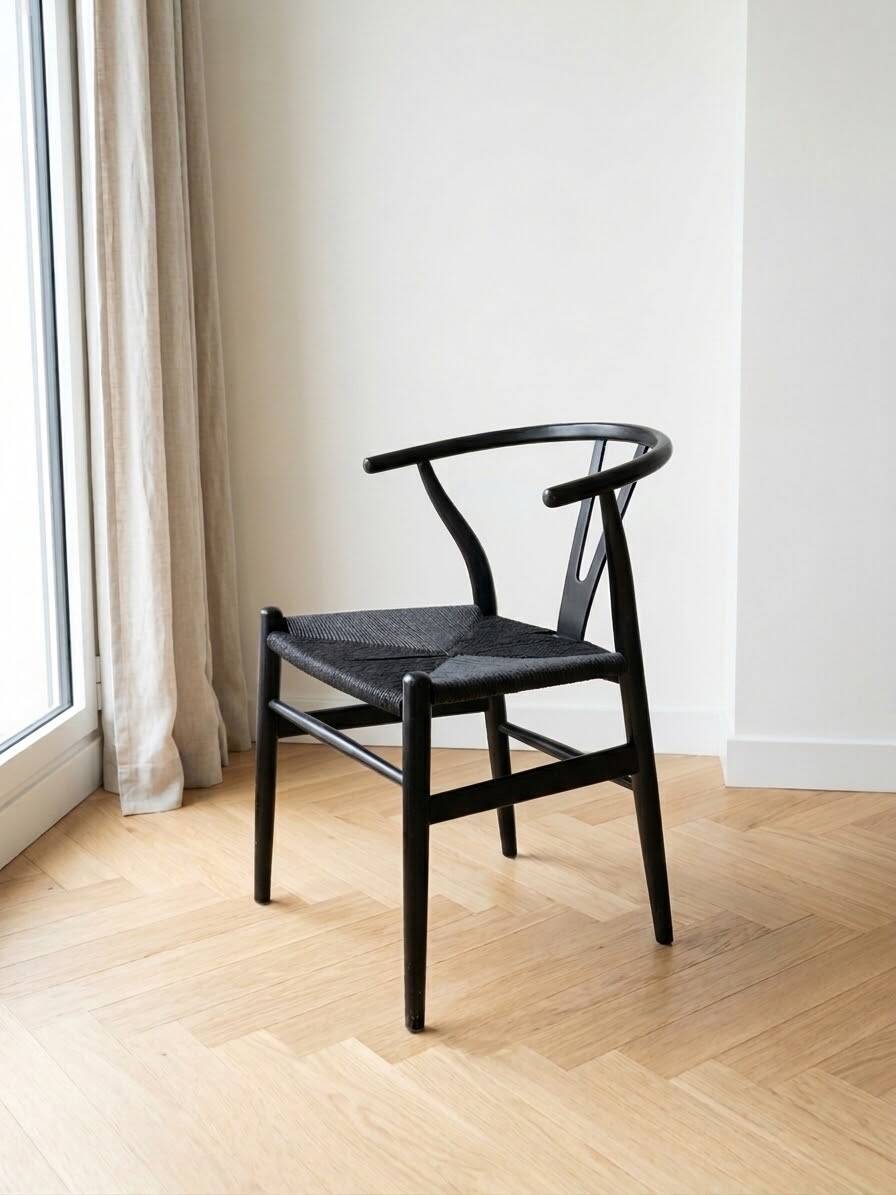 Set of 4 vintage Scandinavian Wishbone style chairs in black wood.