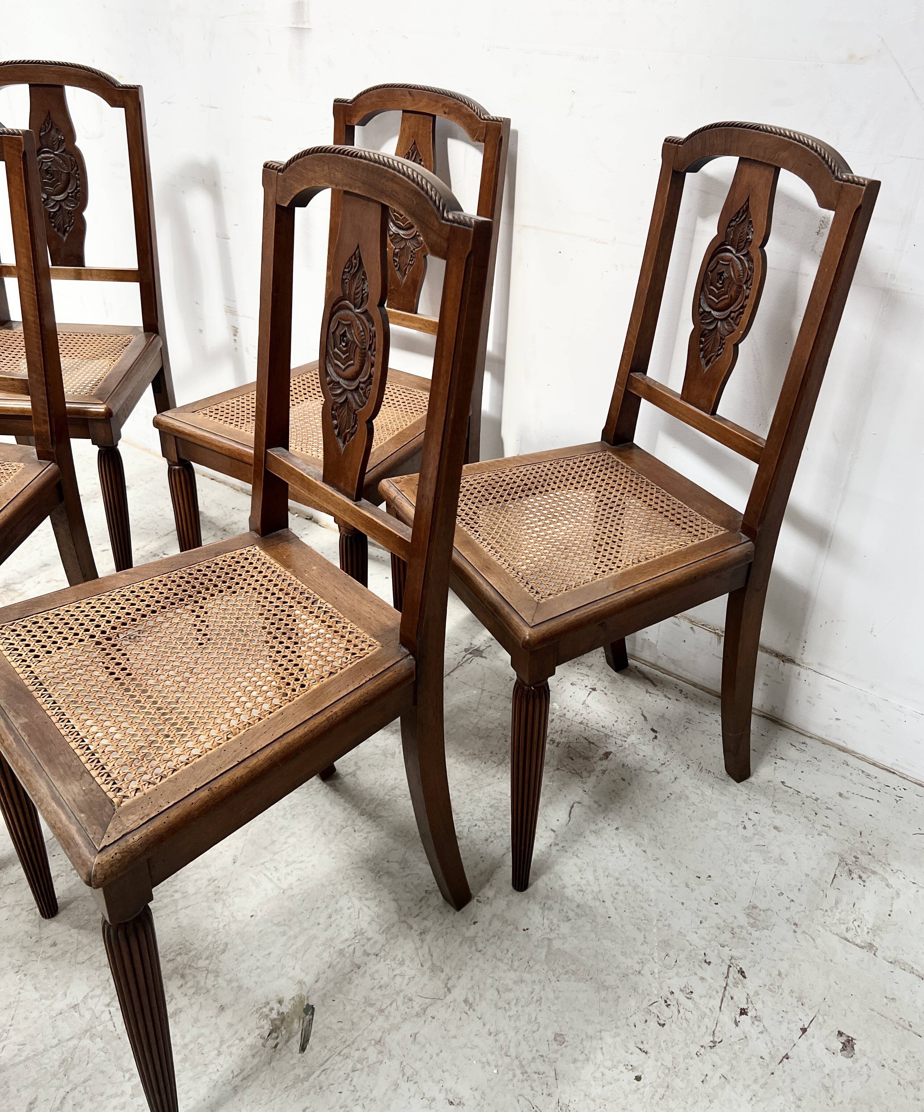Set of six Art Deco chairs in solid walnut, 20th century.