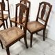 Set of six Art Deco chairs in solid walnut, 20th century.