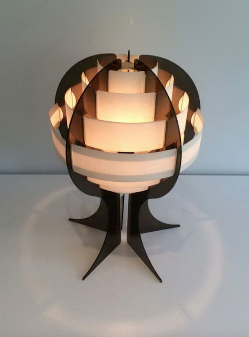 Modernist lamp in plexiglass and white plastic strips.