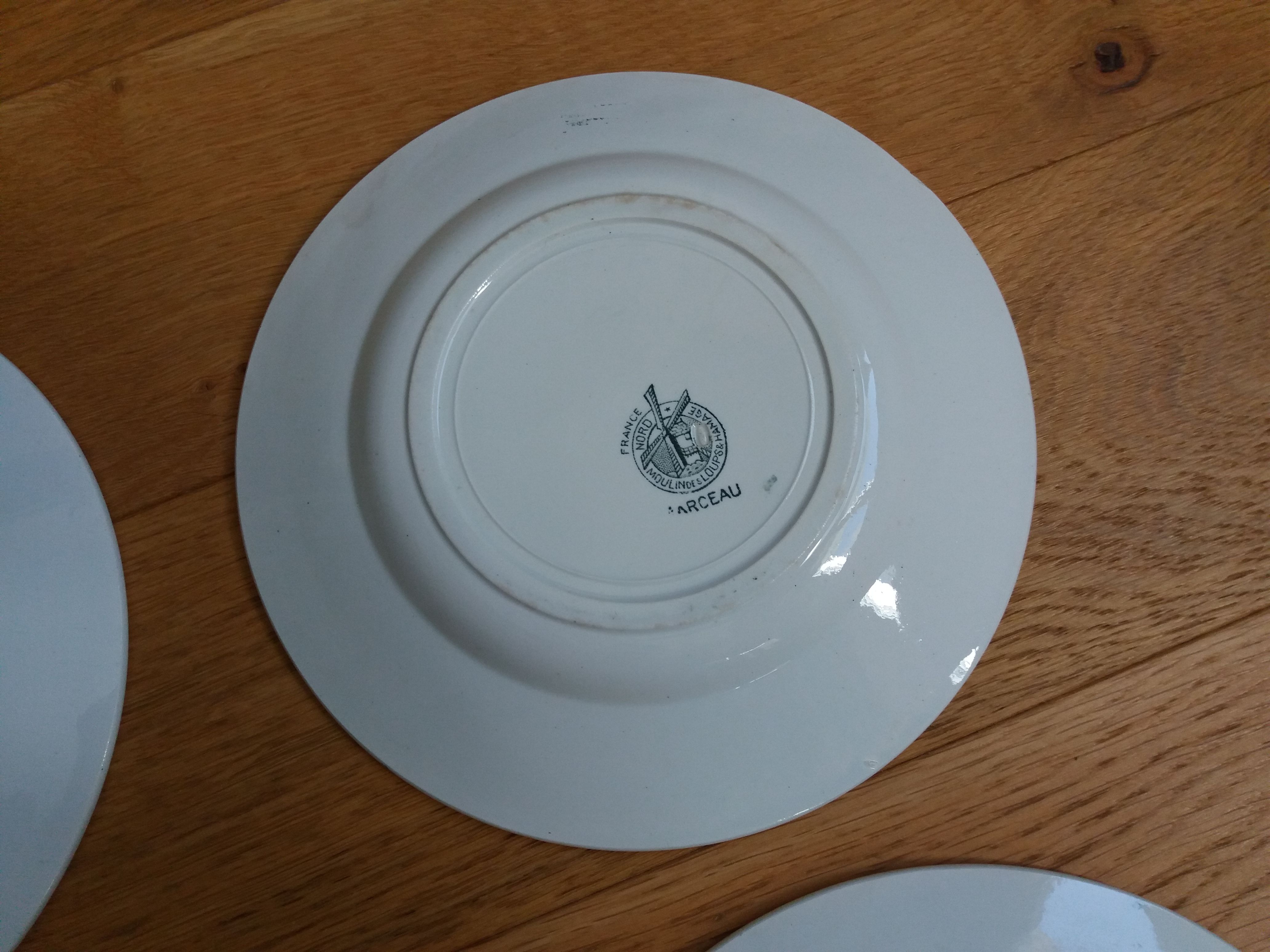 4 mismatched flat plates Terre de fer Moulin des Loups and Hamage