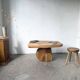 Organic brutalist coffee table in solid cedar, trunk pedestal, 1970s.