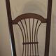 Antique nursing chair in wood and straw from Brittany (late 19th / early 20th century)