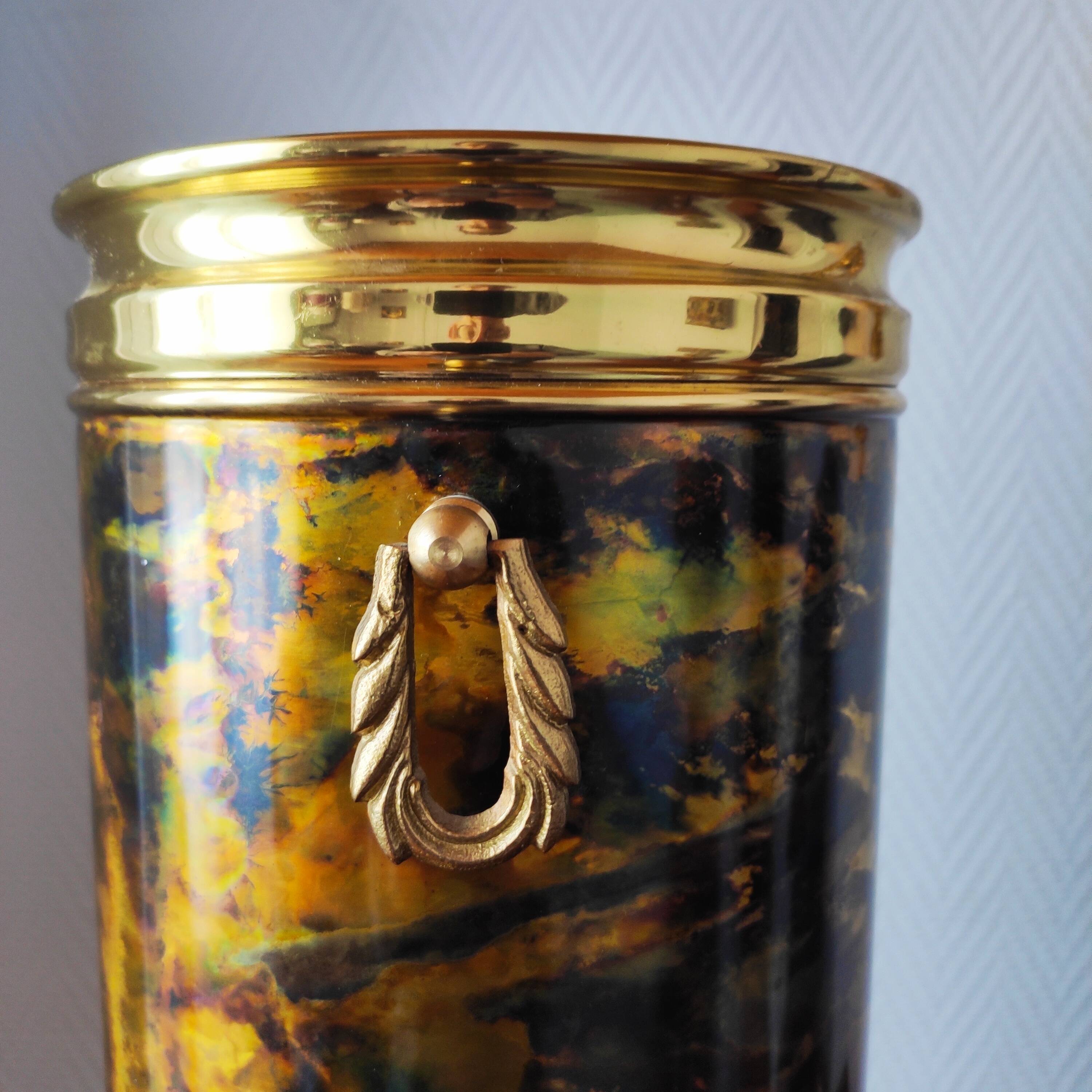 Flame-patterned golden umbrella stand