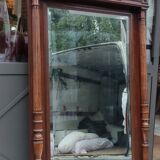 Old large carved wooden mirror