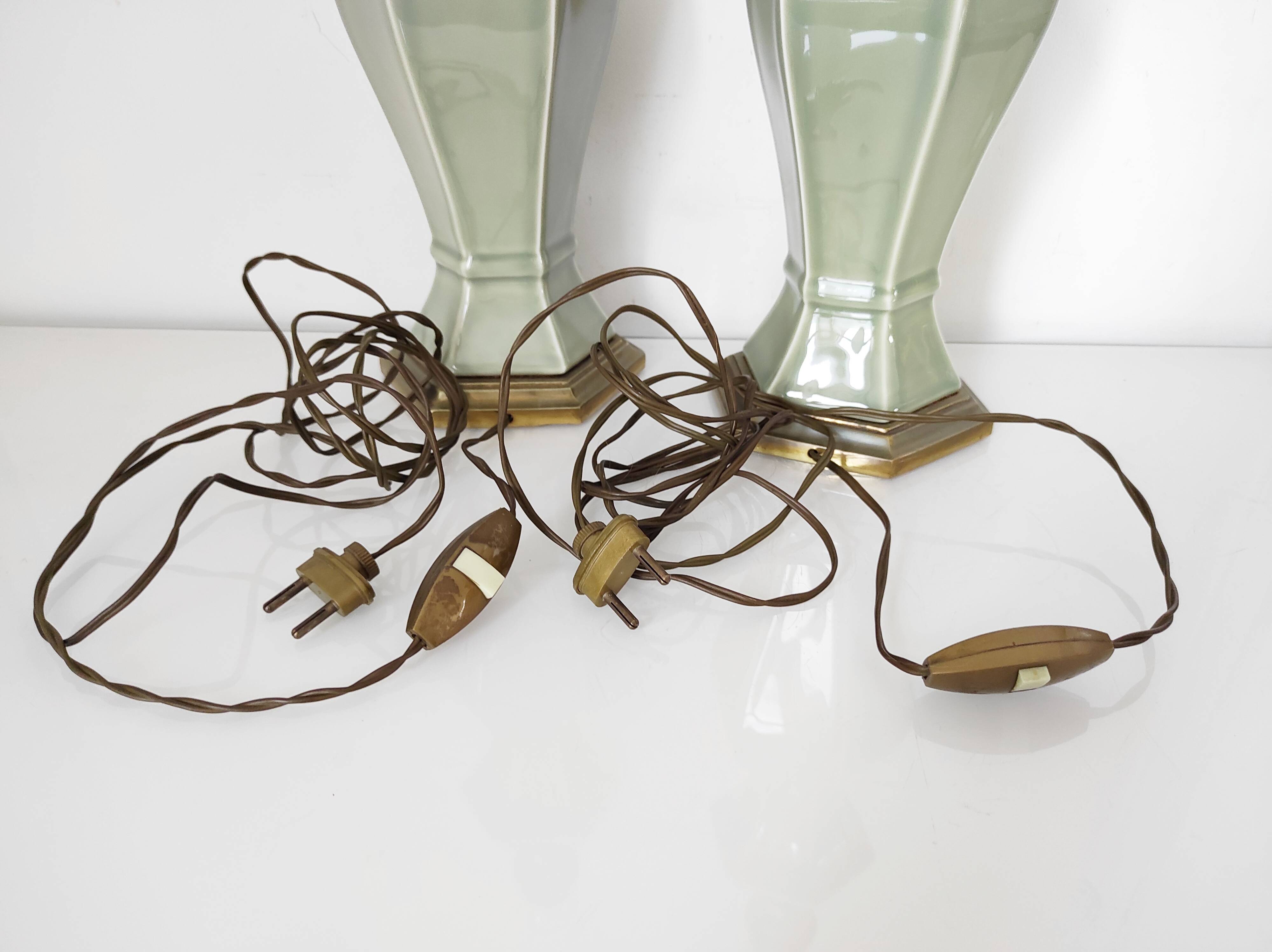 Two celadon-colored ceramic lamp bases