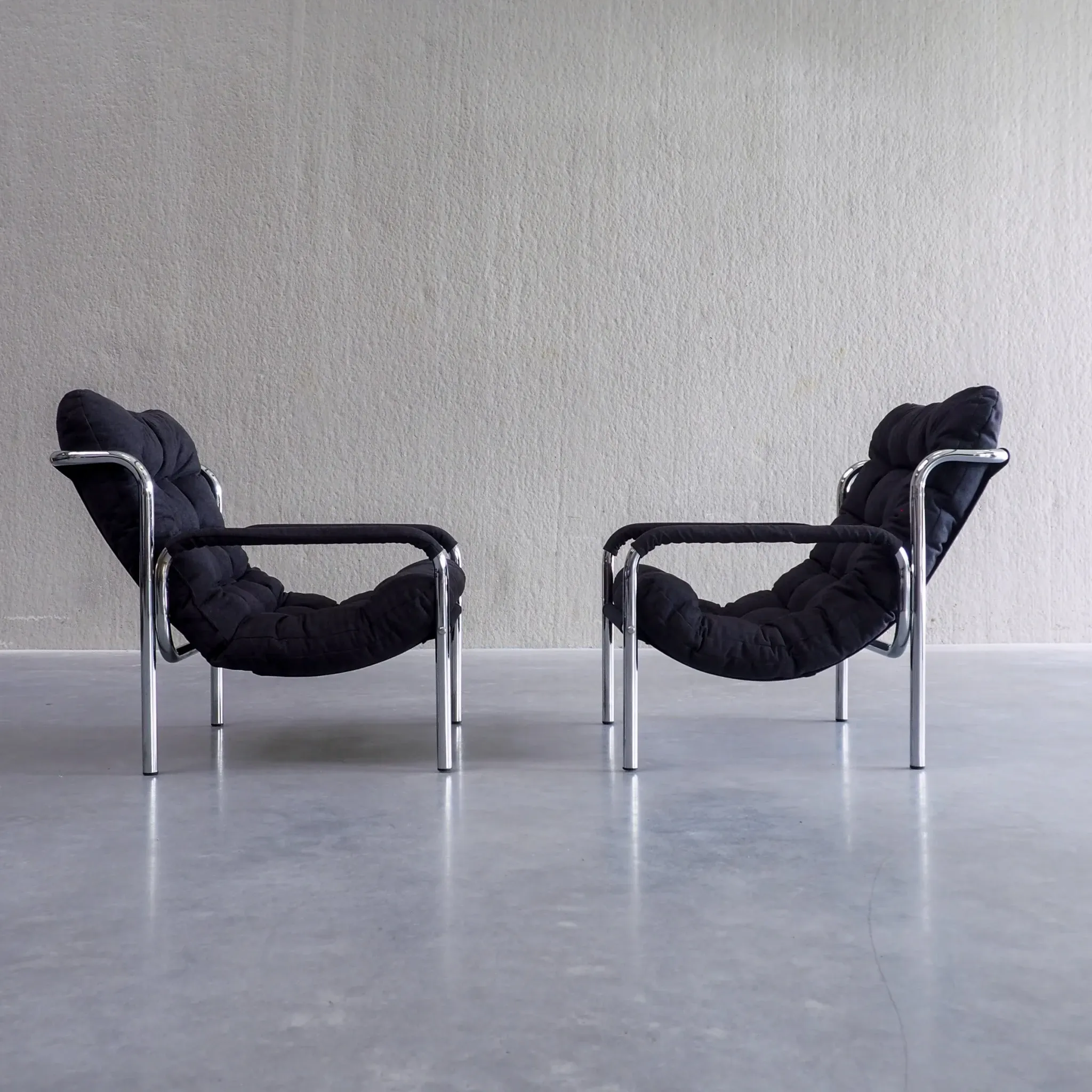 Pair of mid-century modern tubular lounge chairs
