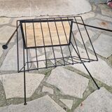 Bedside table with magazine holder