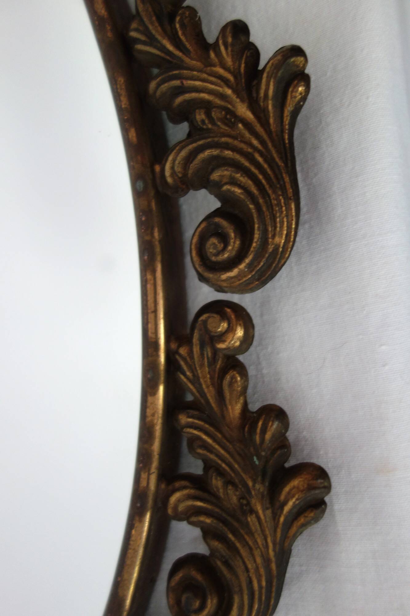 Antique oval art deco brass mirror