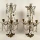 Pair of candlesticks with tassels and flowers in white porcelain