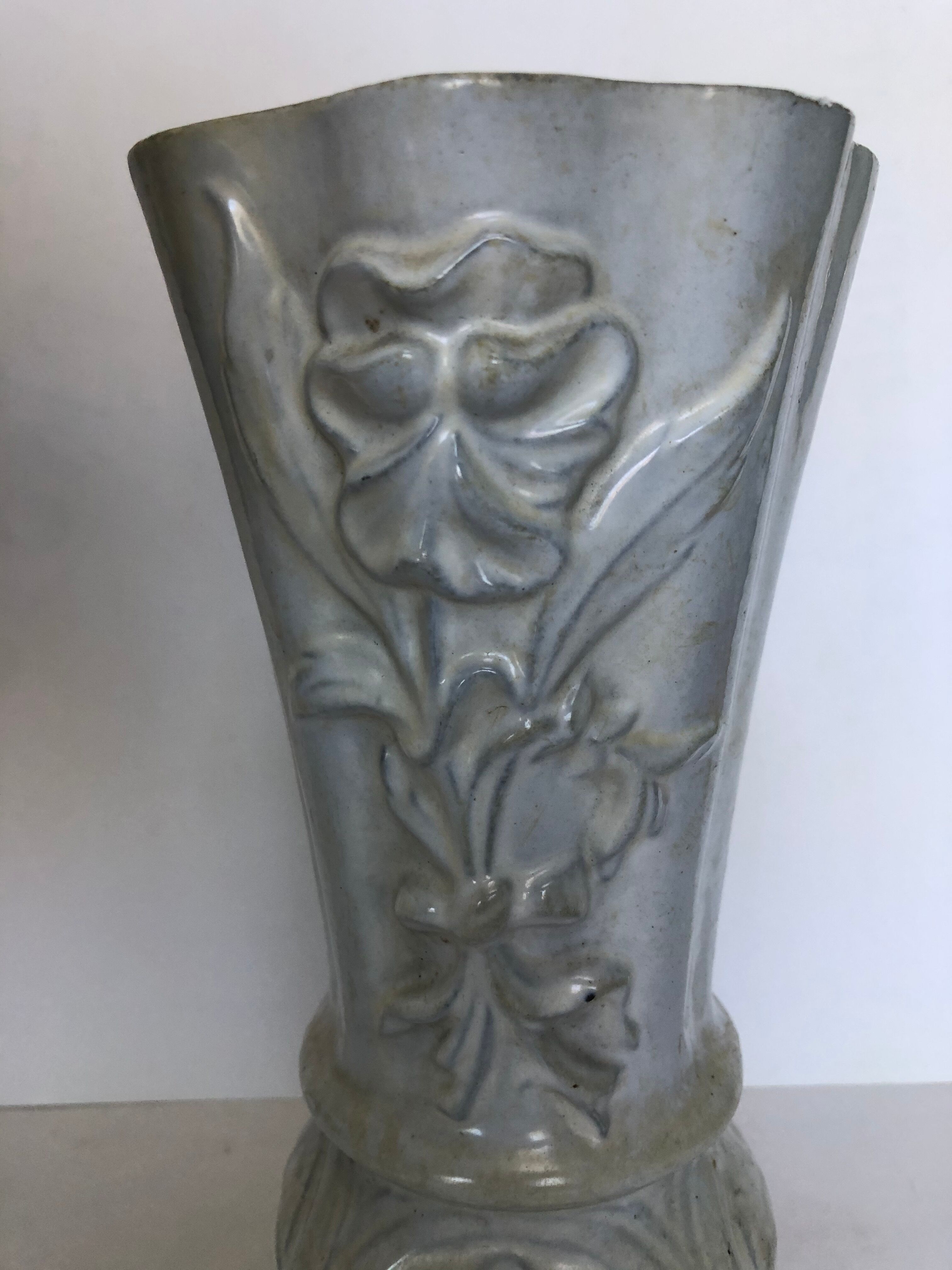 Ancient enamelled cast iron vase