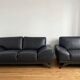 2-seater sofa set + Roche Bobois leather armchair — wooden legs
