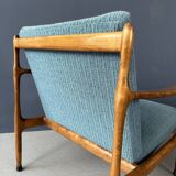 Une paire de fauteuils turquoise