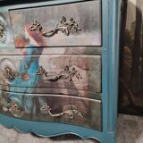 Patinated crossbow chest of drawers